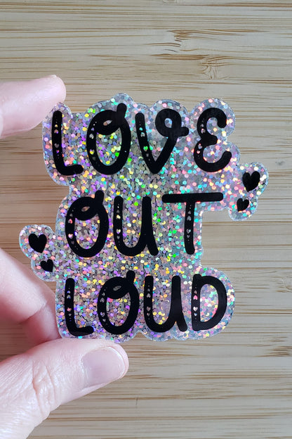 Glitter sticker with a call to inspire and uplift those around us, emphasizing the importance of being true to ourselves.