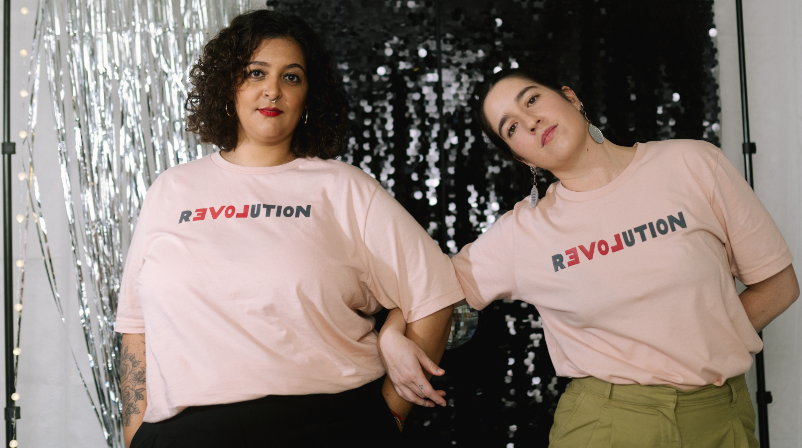 Vibrant graphic t-shirt promoting a love-centered revolution.