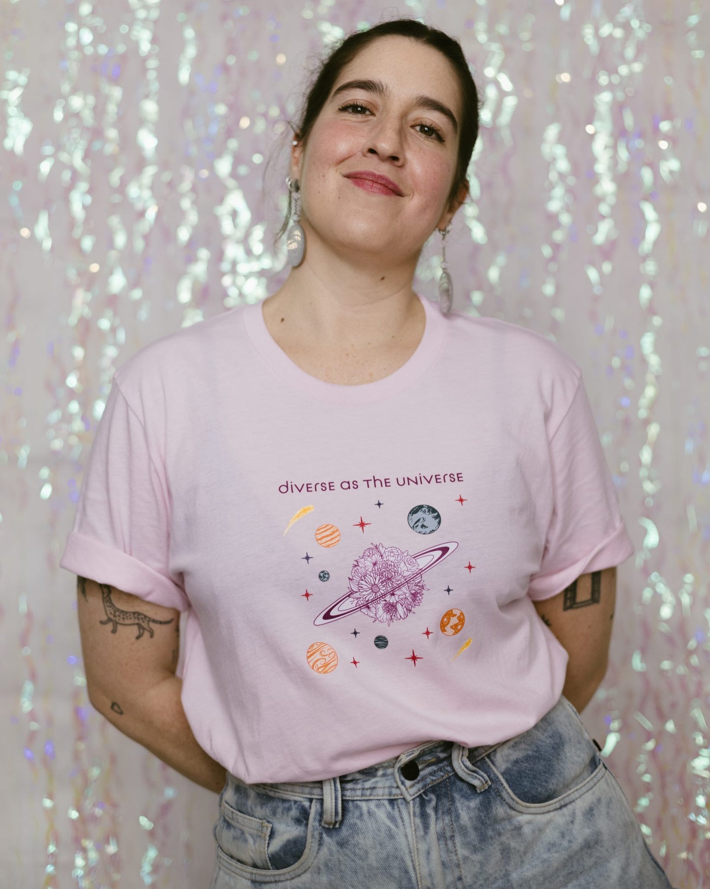 Gender-inclusive sizing cotton t-shirt with a graphic that celebrates diverse identities.